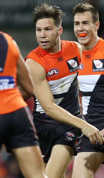 SLIDER-SEMIGREENEMRO.jpg GIANTS forward Toby Greene celebrates one of his three goals against the Swans on Saturday. - GWS Giants,AFL,Toby Greene,Harry Himmelberg,Jacob Hopper